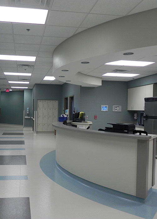 Hospital reception desk and hallway.