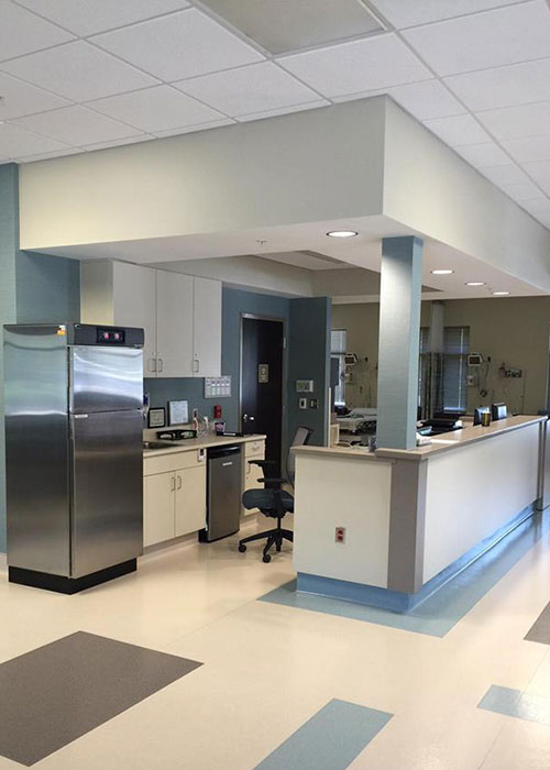 Hospital reception area with kitchenette.