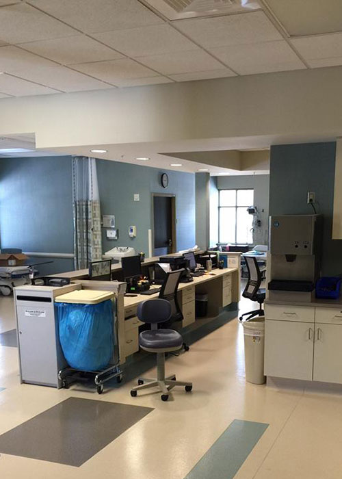 Hospital reception desk and waiting area.